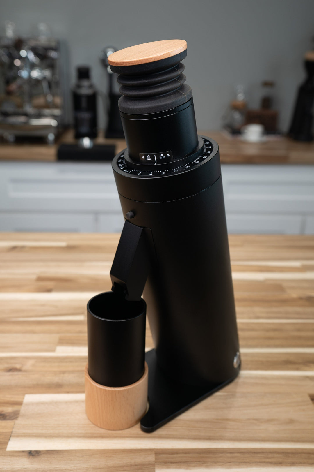 Turin DC63 — grinder and dosing cup on wood counter
