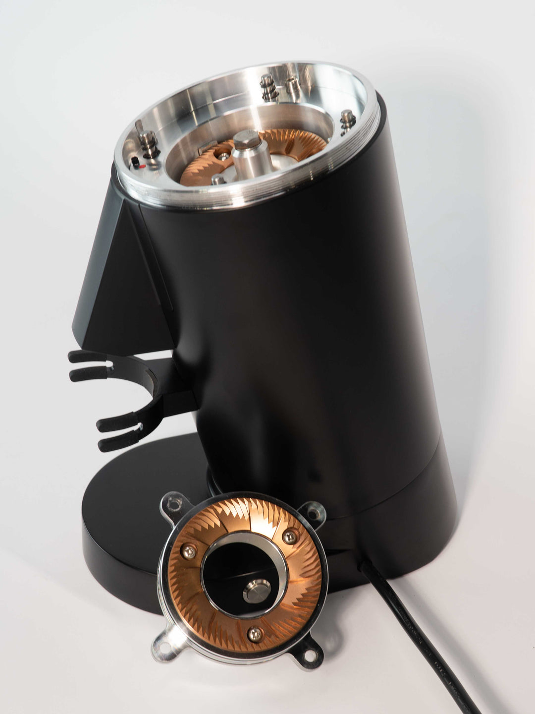 Turin DF83 Gen 2 — upper burr carrier removed beside grinder