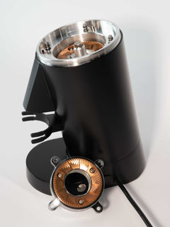 Turin DF83 Gen 2 — upper burr carrier removed beside grinder