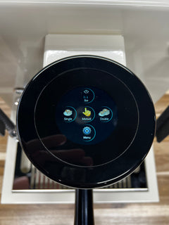 Turin MC3 espresso machine — circular touchscreen menu