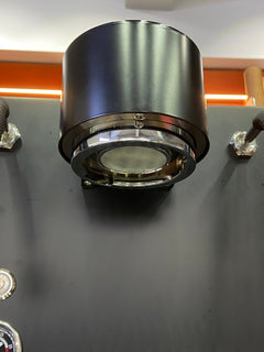 Turin MC3 espresso machine — black brew-group underside and shower screen