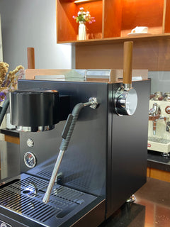 Turin MC3 espresso machine — black side panel and steam wand