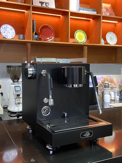 Turin MC3 espresso machine — black machine from opposite angle