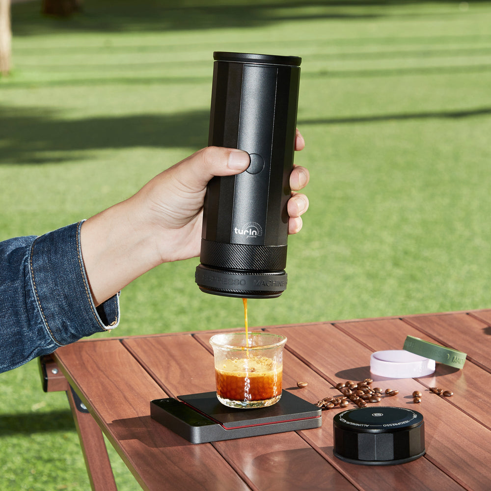 Turin portable coffee system — TrekBrew extracting coffee outdoors